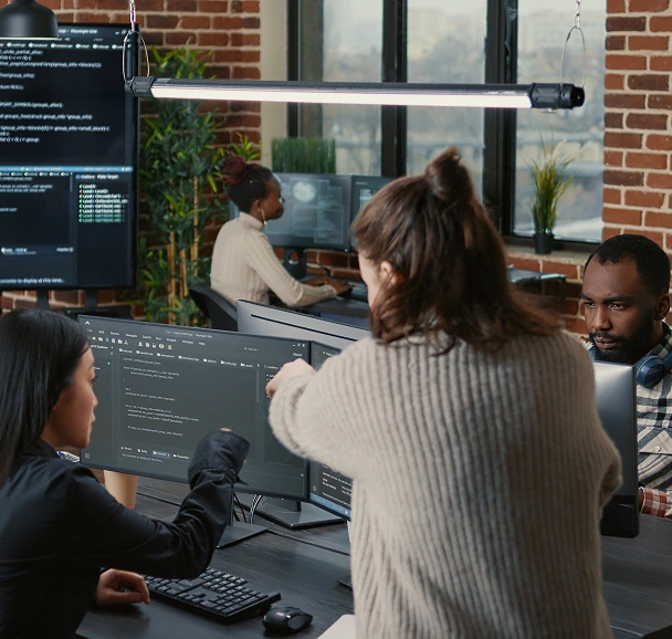 Laravel and PHP developers reviewing API code for a custom software project